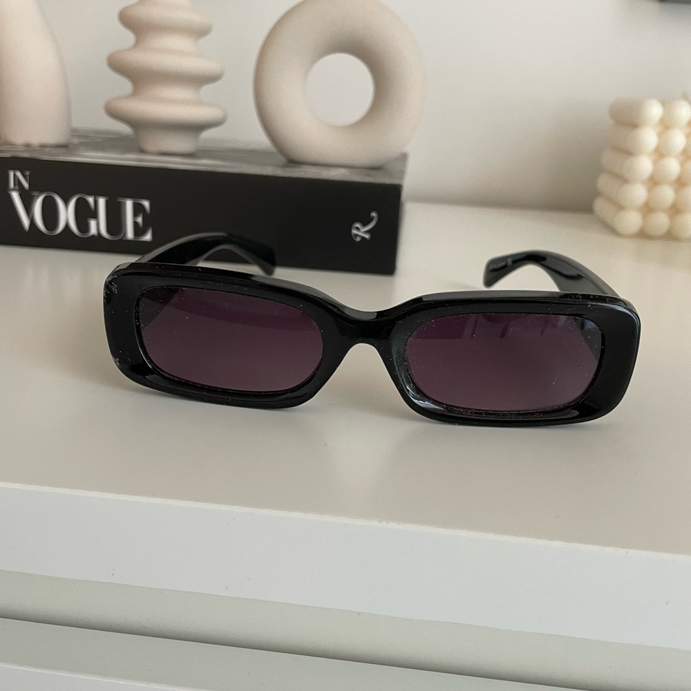 Black sunglasses.